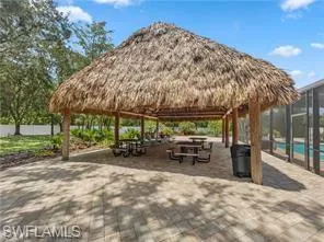 View of property's community featuring a patio and a gazebo