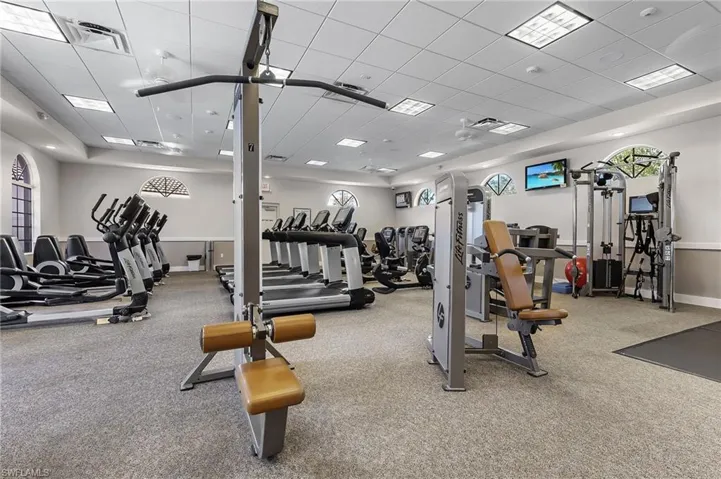 Exercise room with carpet flooring