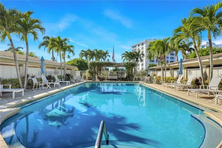 Community pool featuring a patio area
