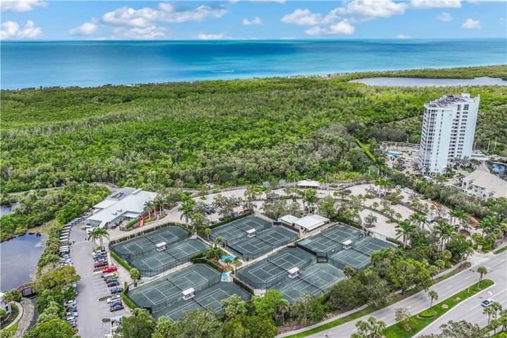 Pelican Bay Clubhouse and aerial view of amenities