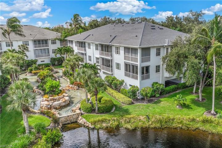 View of the rear of the property overlooking the lagoon style water feature
