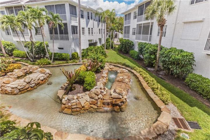 View of water feature from rear screened/glassed lanai