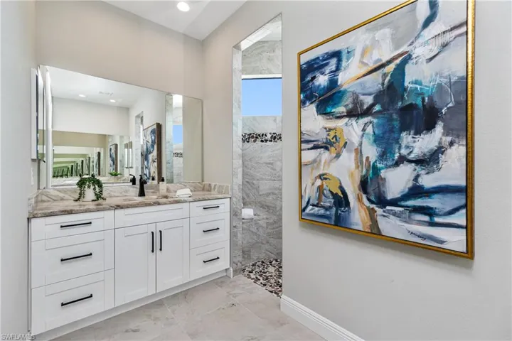 Bathroom with tile floors and vanity