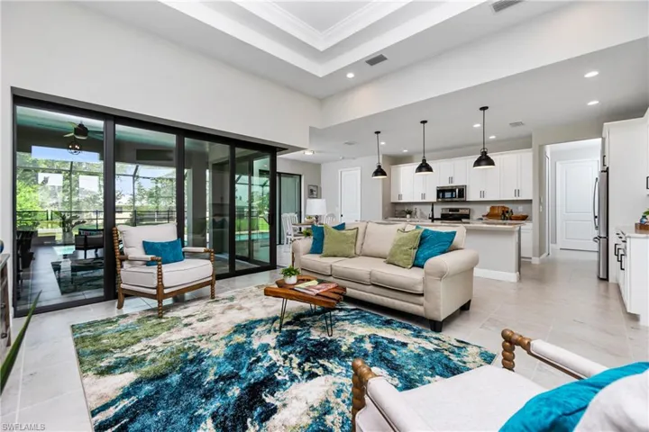 Living room with coffered ceiling.  a