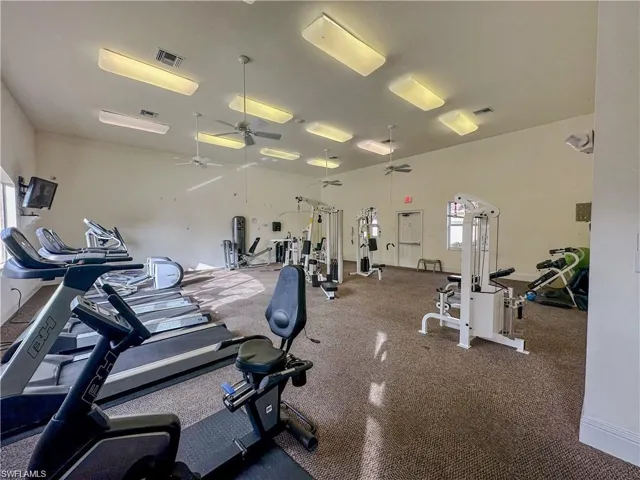 Exercise room featuring ceiling fan