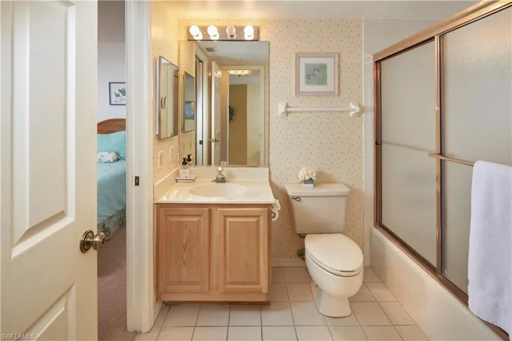 Guest en suite bathroom with tub/shower combination.
