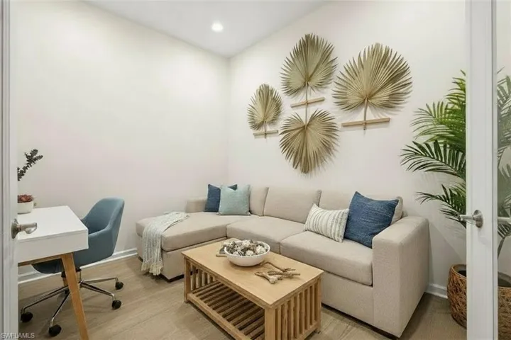 Virtually Staged -Office with light wood-type flooring and recessed lighting