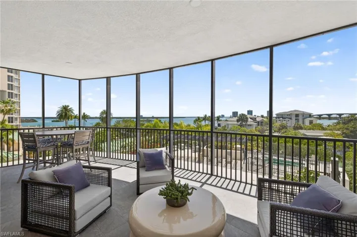 Large screened in terrace , comfortable space for relaxing and taking in the tropical views