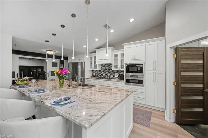 kitchen looking into office/den or guest bedroom