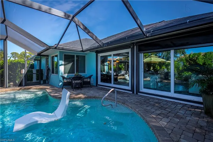 pool looking into enclosed extended lanai under air