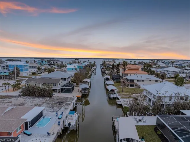 Aerial view of residential area with a nearby body of water