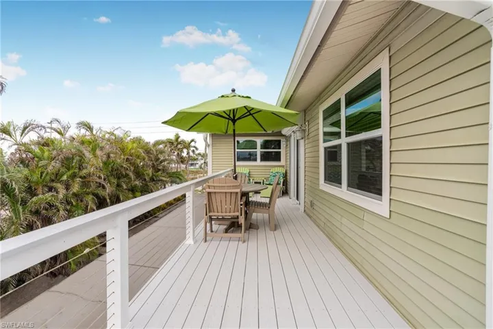 Wooden terrace with outdoor dining space