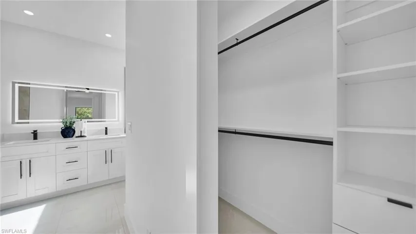 Walk in closet with a sink