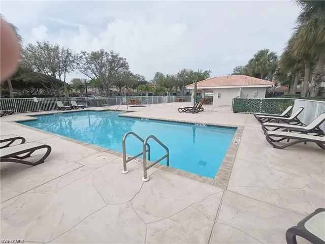 Colonial Links 2nd pool area with a patio