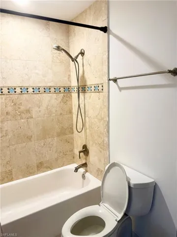 This convenient second bathroom serves as a private ensuite to one of the bedrooms. It carries the home’s light-filled aesthetic through, offering a clean and refreshed feel for guests or residents.