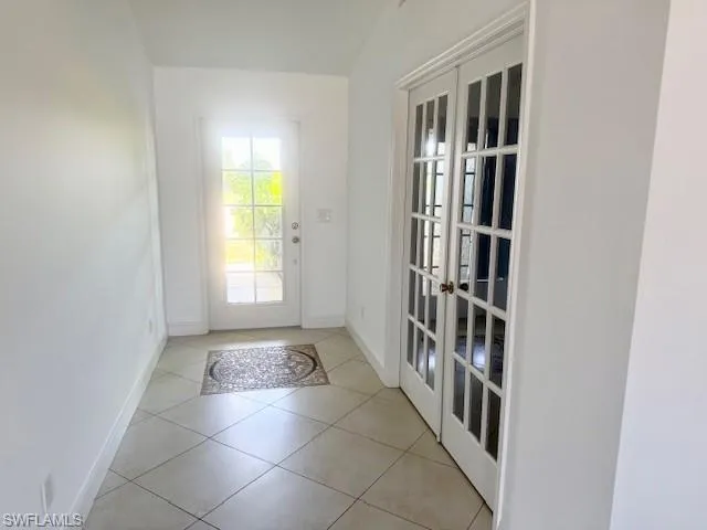 The entry hallway welcomes you with a bright and inviting feel, featuring clean lines and a seamless flow into the main living areas. Thoughtfully designed, it creates a warm first impression while maintaining a functional and well-connected layout.