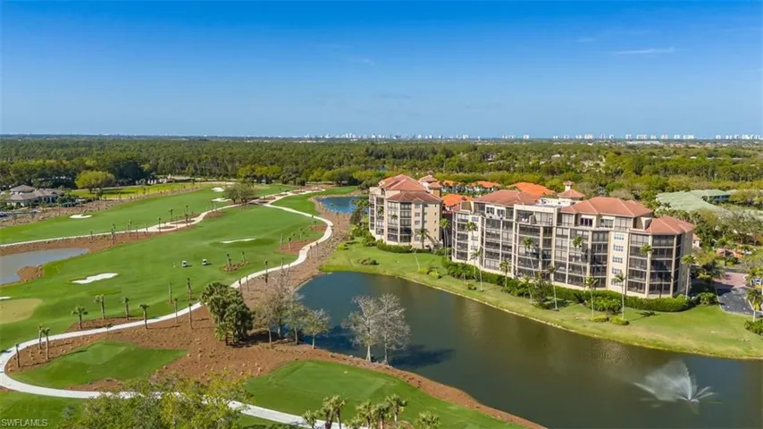 Bird's eye view of a local golf course and a nearby body of water