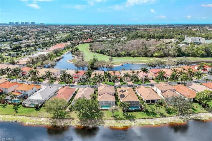 Aerial view of rear exterior and the Gulf of Mexico in the distance.
