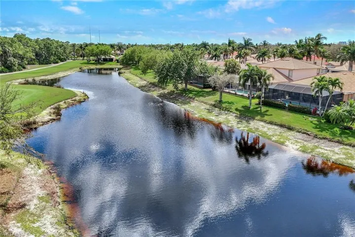 A tranquil pond sits between the property and the golf course.