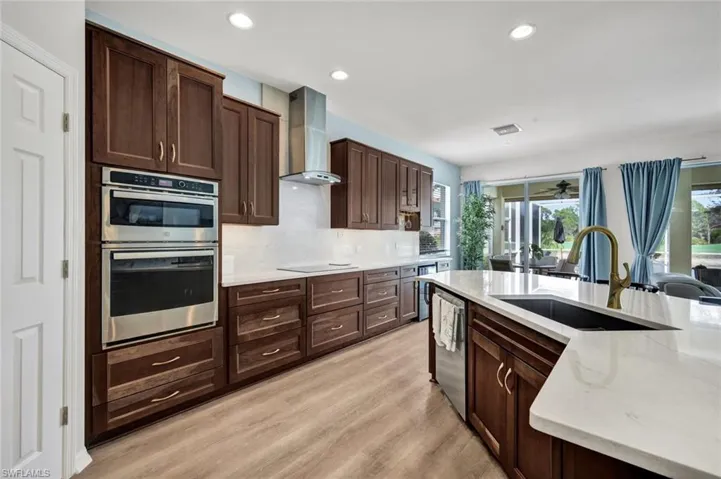 The kitchen offers abundant drawer storage, making organization easy and convenient.