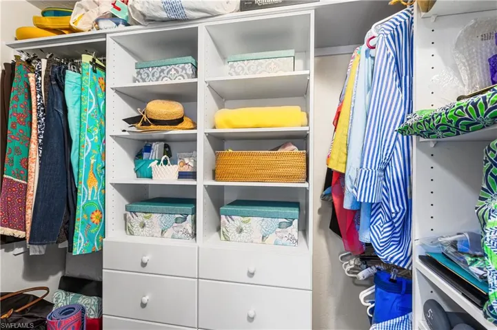 Primary bedroom custom closet.