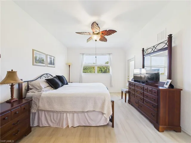 Bedroom featuring light wood-style flooring and ceiling fan