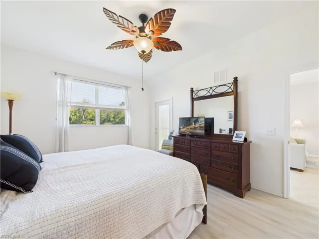 Bedroom featuring light wood-style flooring and ceiling fan
