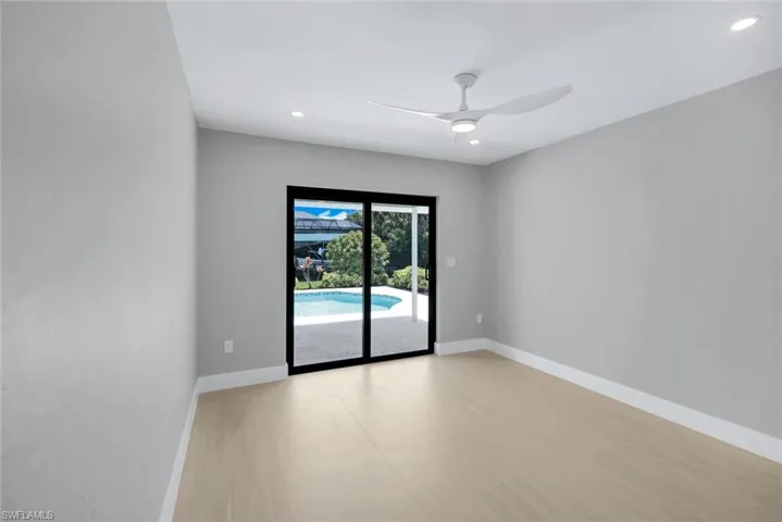 Second guest bedroom provides access to the pool.