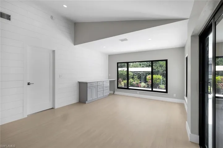 Home is light, bright and airy - featuring hurricane impact windows throughout!