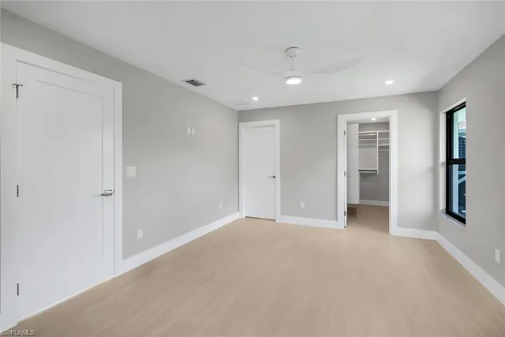 Primary bedroom featured a huge walk-in closet AND access to laundry room.