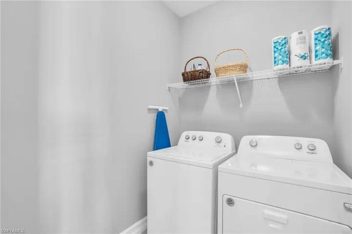 Laundry room with washer and dryer