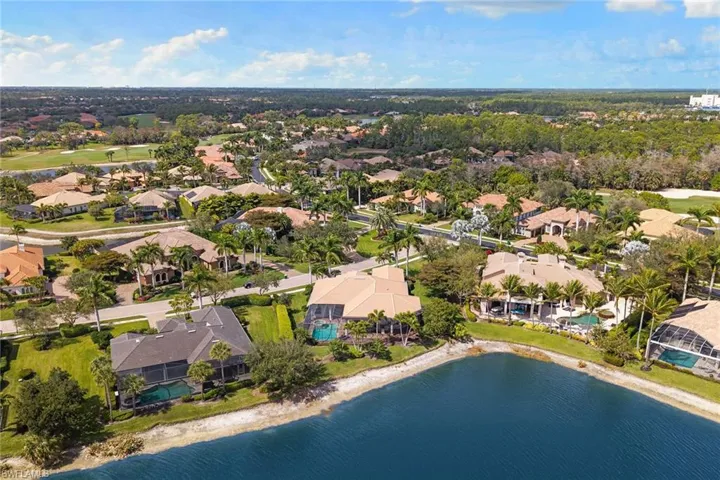 Aerial view of residential area with a nearby body of water