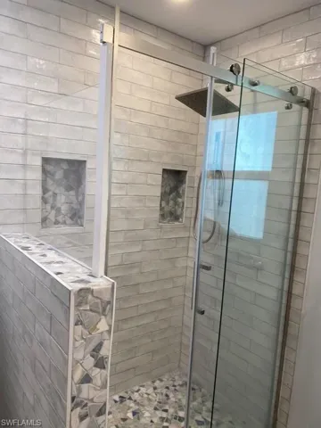Bathroom with a shower stall