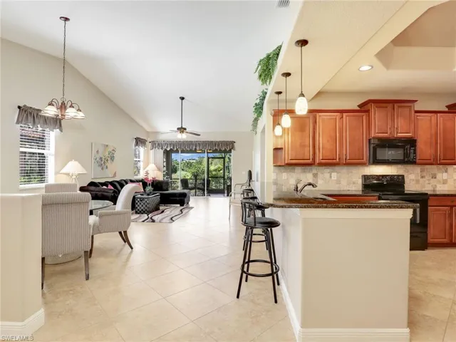 Open-Concept Kitchen, Dining & Living.