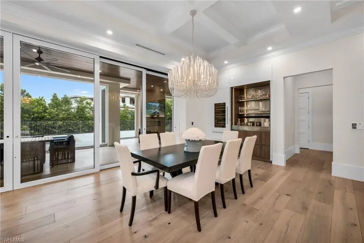 Dining room with bar & sub zero fridge