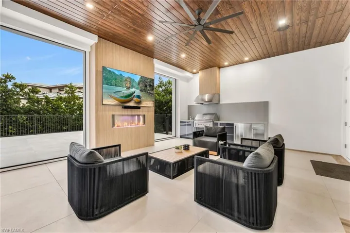 First floor lanai with remote screens and hurrican shutters