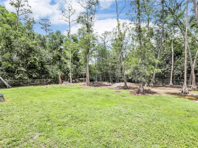 View of fenced backyard