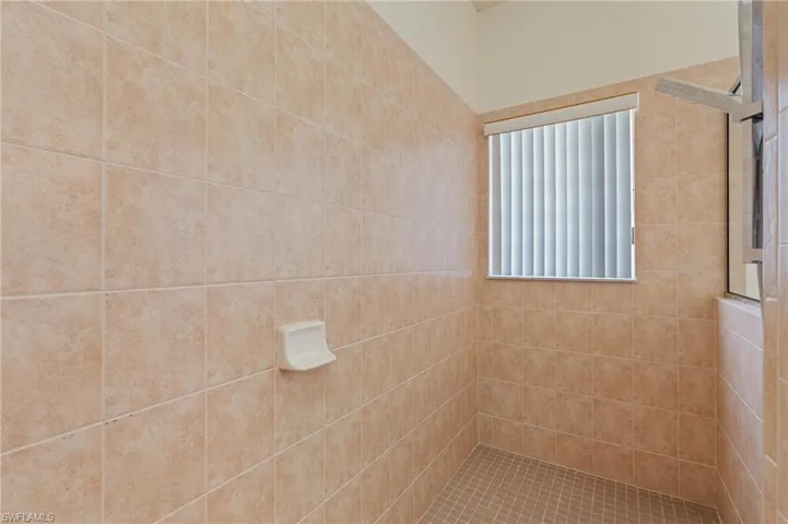 Bathroom with a tile shower