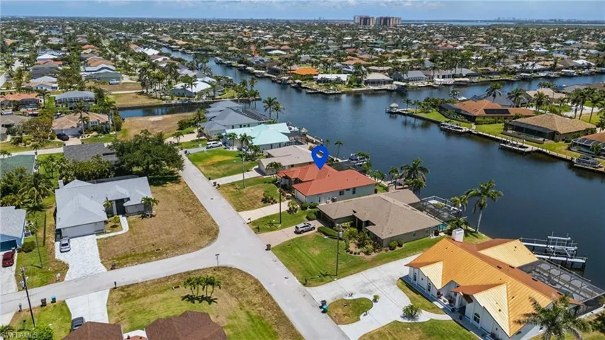 Aerial view with a residential view and a water view