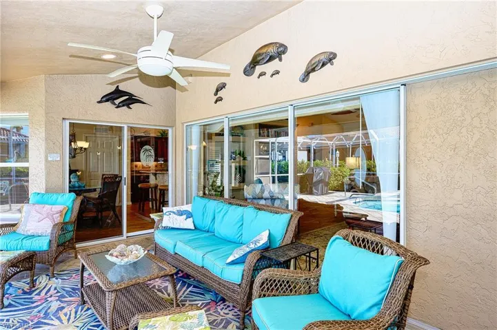 View of patio / terrace with an outdoor living space and ceiling fan