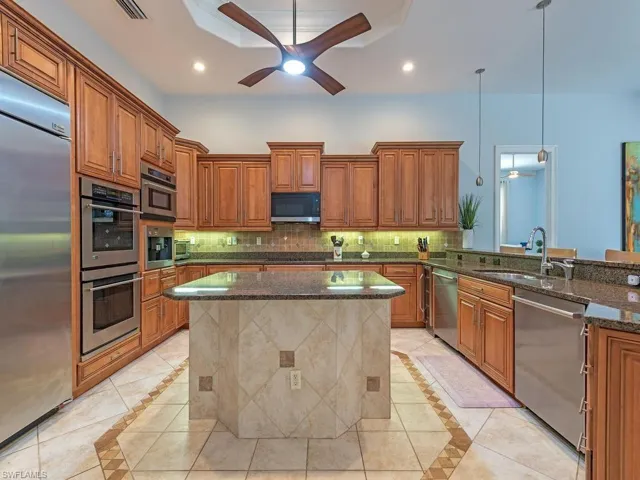 Heart of the house, gourmet kitchen w/ side by side fridge/freezer, huge pantry and large breakfast bar
