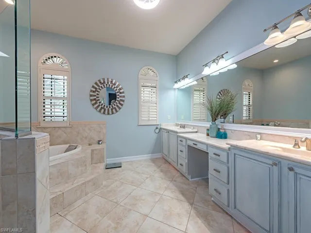 Primary Bath with dual sinks, tub and walk in shower