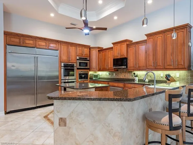 Heart of the house, gourmet kitchen w/ side by side fridge/freezer, huge pantry and large breakfast bar