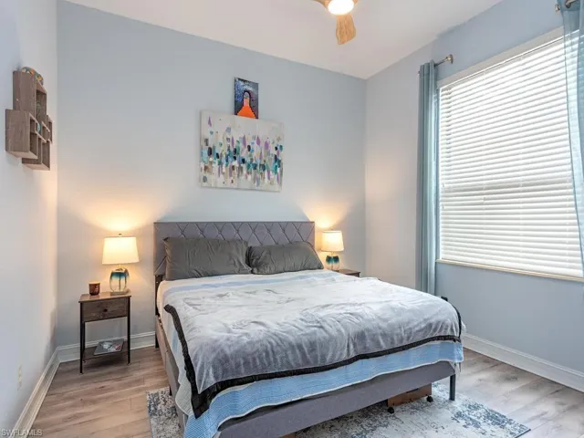 Light-hued walls complementing wood-finish flooring