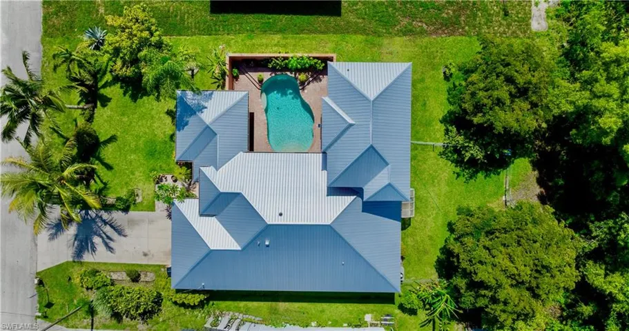 View from above of property with a pool area