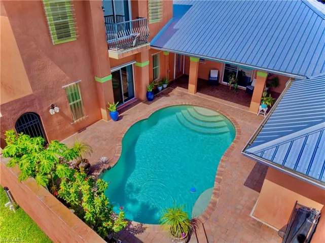 Swimming pool featuring a patio