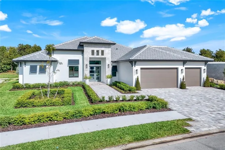 Prairie-style house featuring a garage