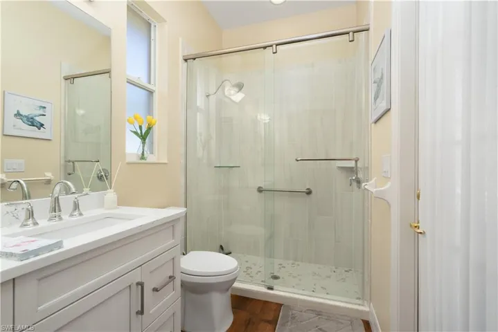2nd bathroom with Quartz vanity and walk-in glass shower