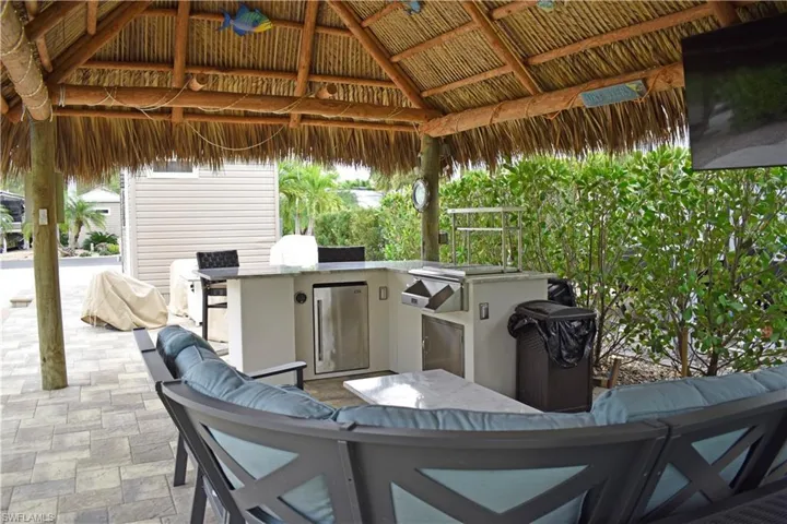 View of patio with a gazebo and an outdoor kitchen