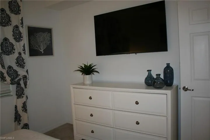 Bedroom featuring baseboards